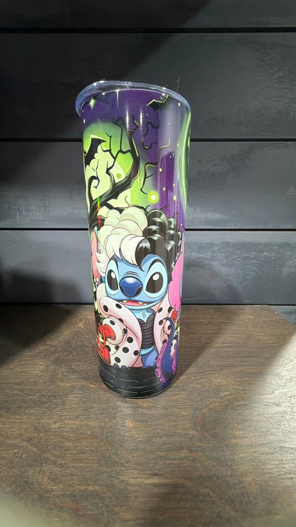 Stitch dresses up as the villains tumbler