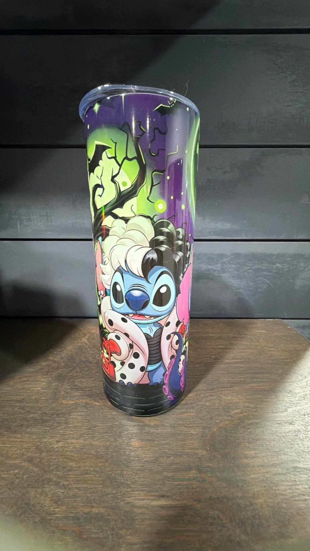 Stitch dresses up as the villains tumbler