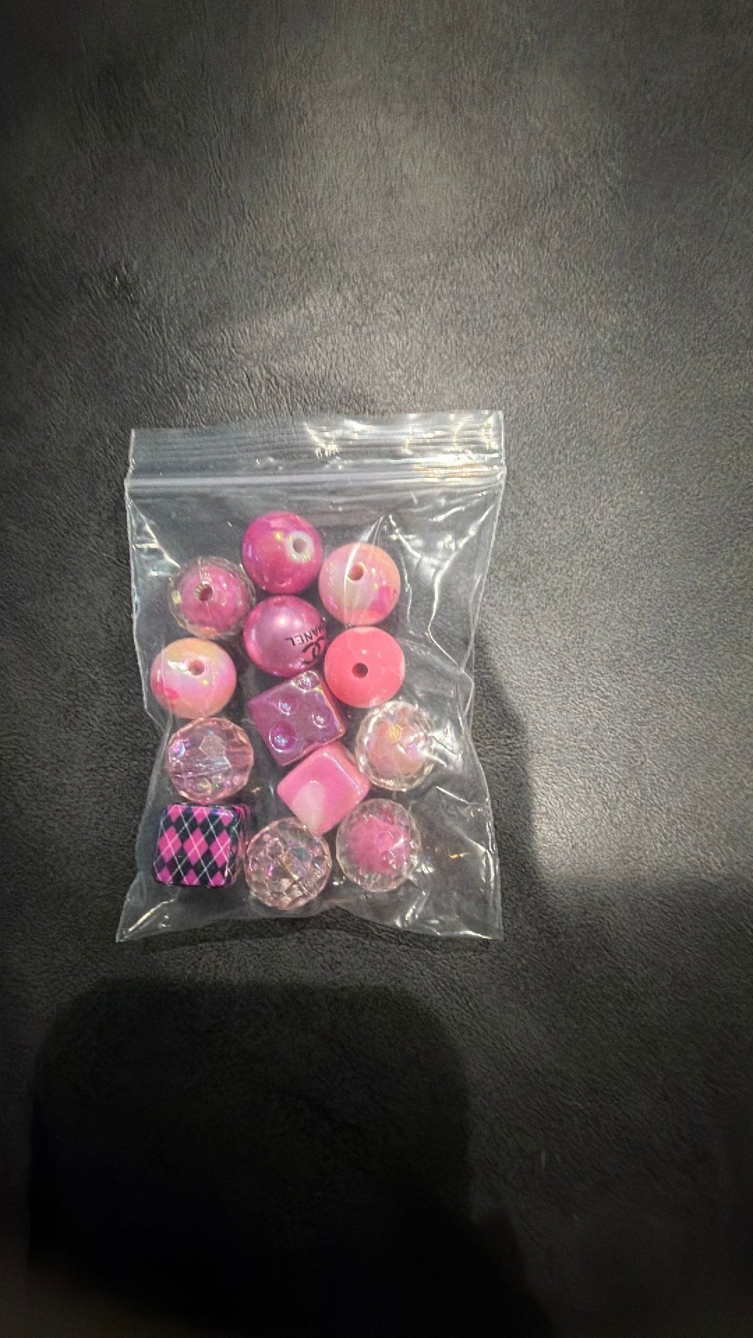 Bag of pink beads