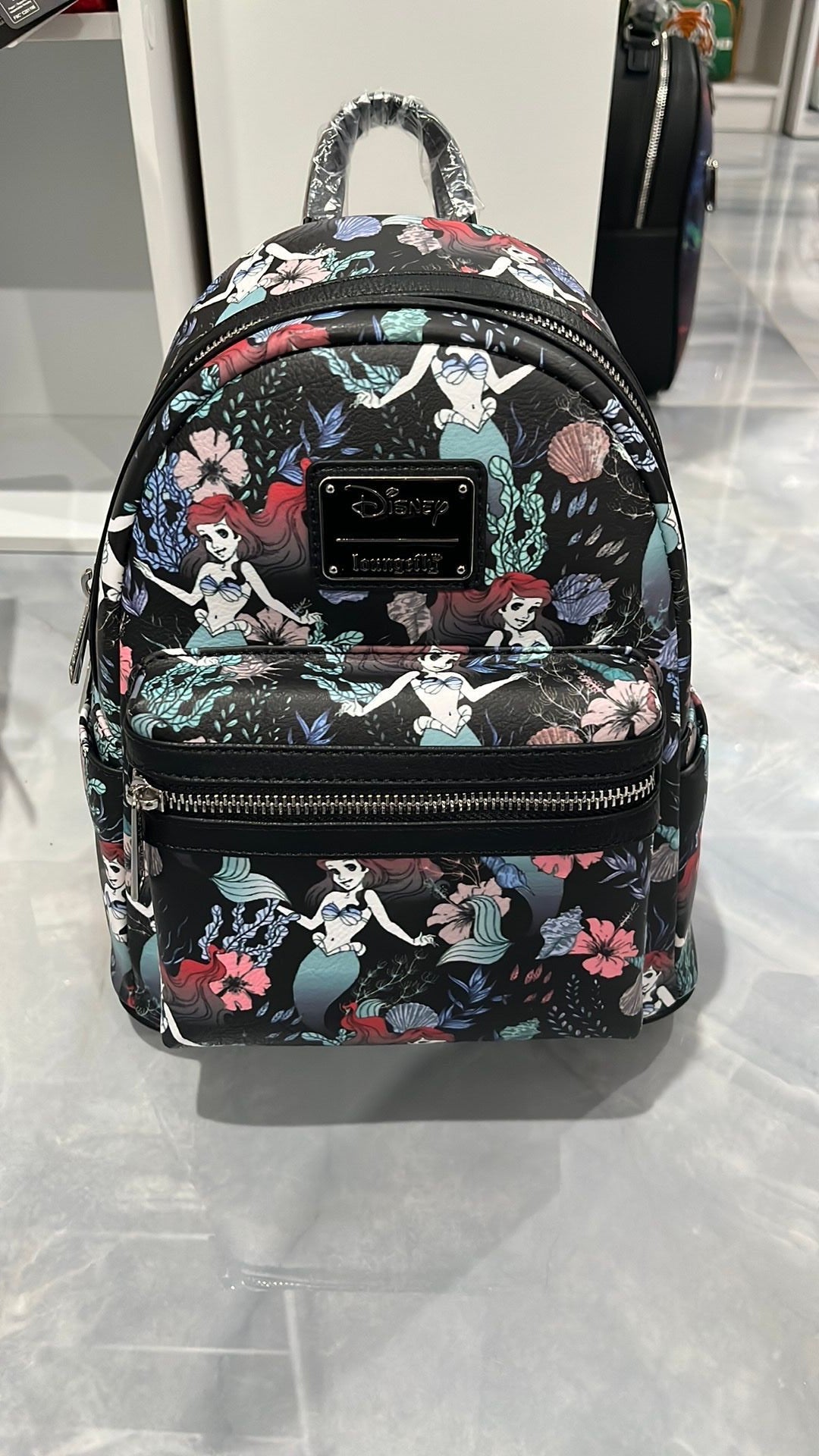 Disney Ariel floral AOP Loungefly backpack. NWT