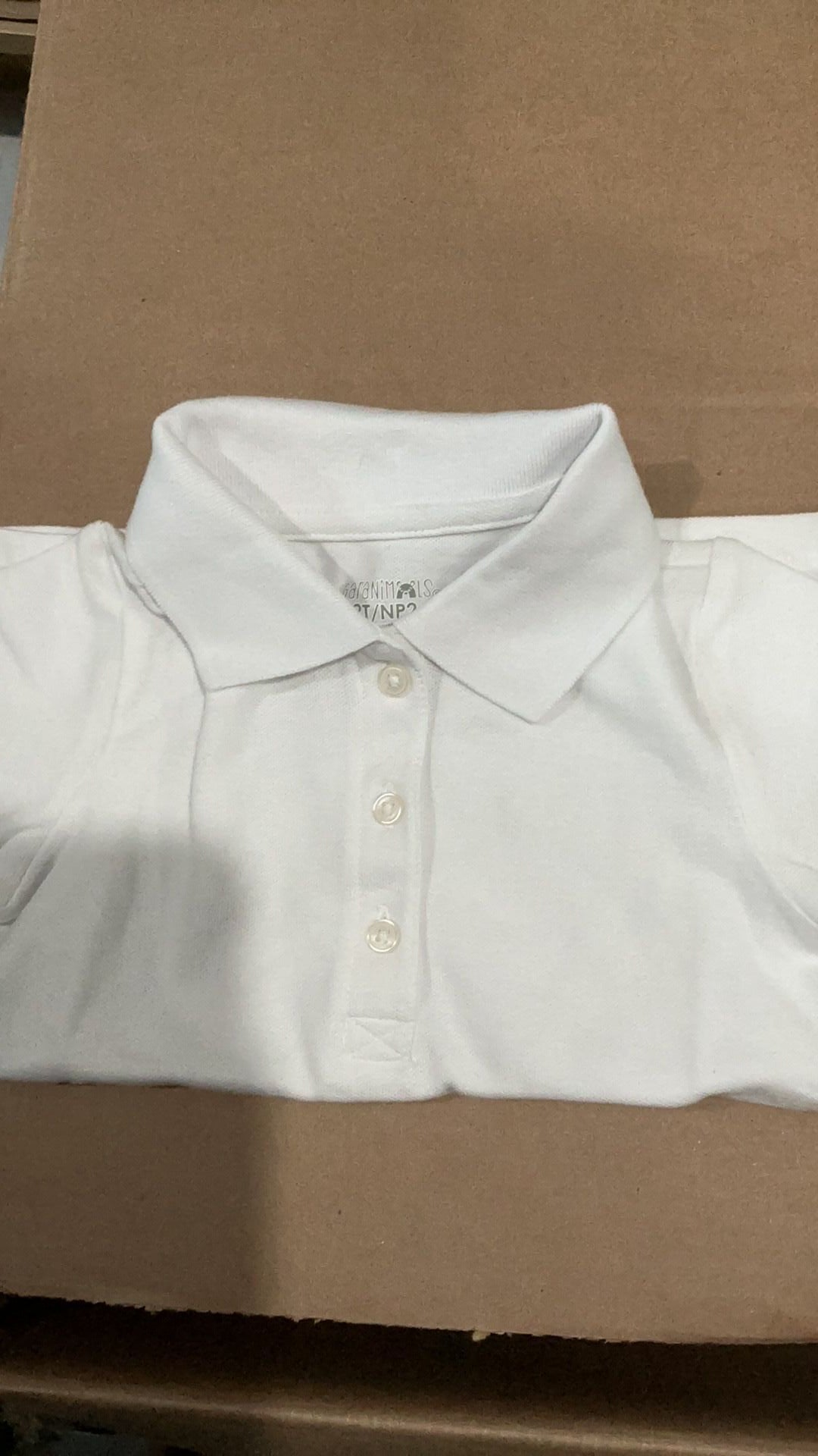 Girls colored shirt size 2T NWT