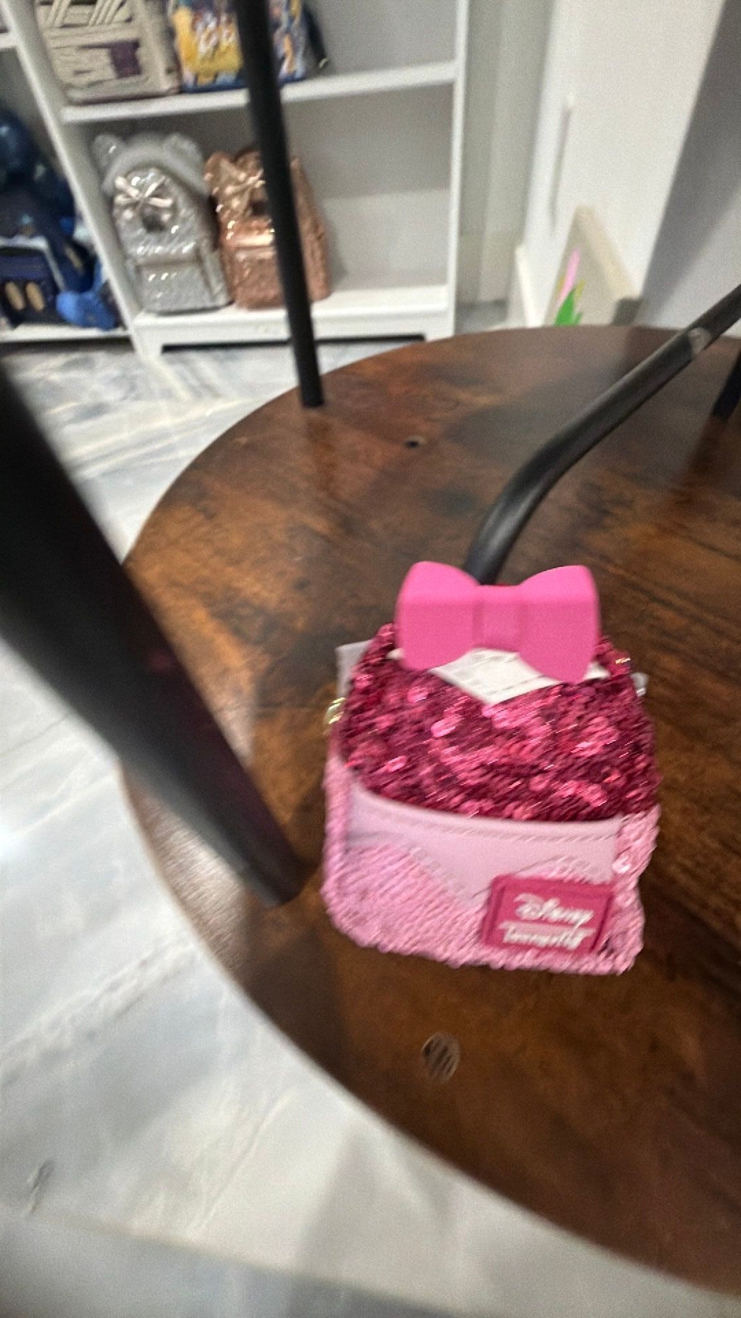 Aurora bag charm confined