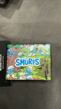 The Smurfs Bi-Fold Wallet - Picnic And Swimming Group Scene And Title Logo