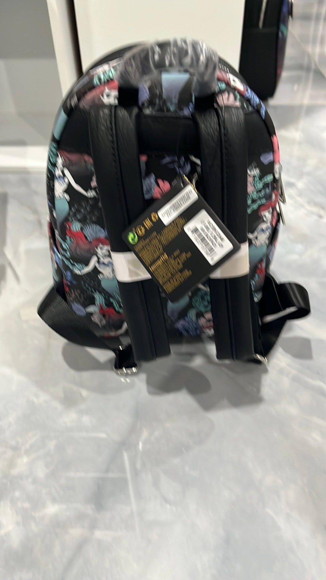 Disney Ariel floral AOP Loungefly backpack. NWT