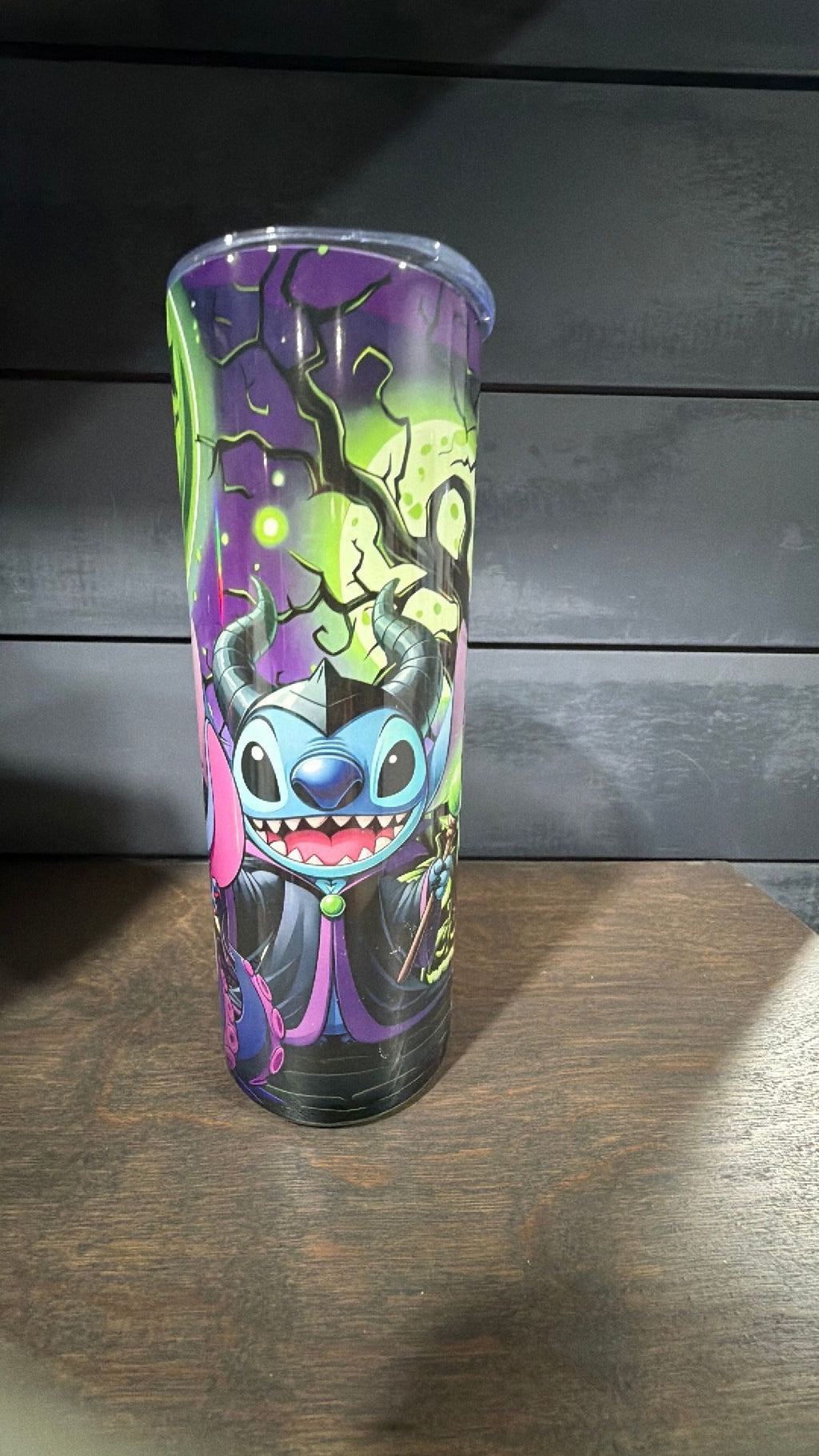 Stitch dresses up as the villains tumbler