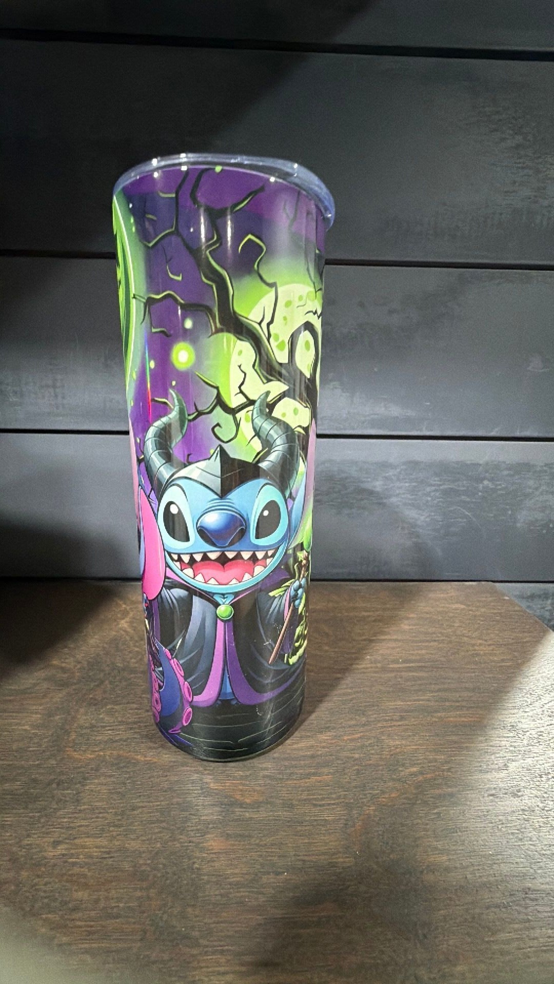Stitch dresses up as the villains tumbler
